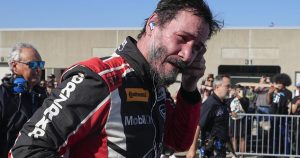 keanu-reeves-debuts-as-pro-auto-racer-at-indianapolis-motor-speedway,-spins-out