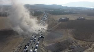 masses-reach-the-tishrin-dam-under-attack