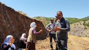 women-in-lice-stop-excavation-work-for-mining-project