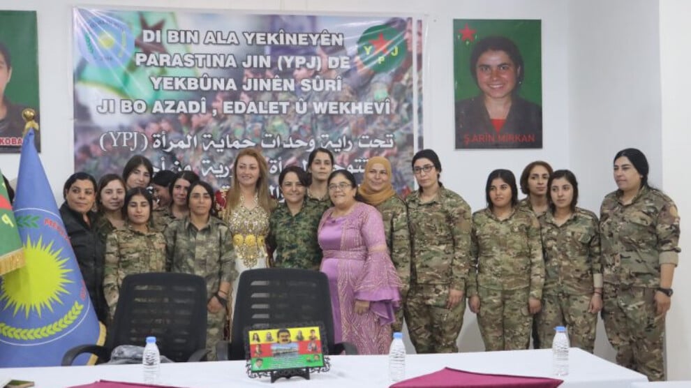 under-the-banner-of-the-ypj,-syrian-women-unite-for-freedom,-justice-and-equality