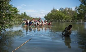 world-news-in-brief:-refugee-boat-tragedy-in-andaman-sea,-gaza-vaccinations,-farmers’-lending-scheme