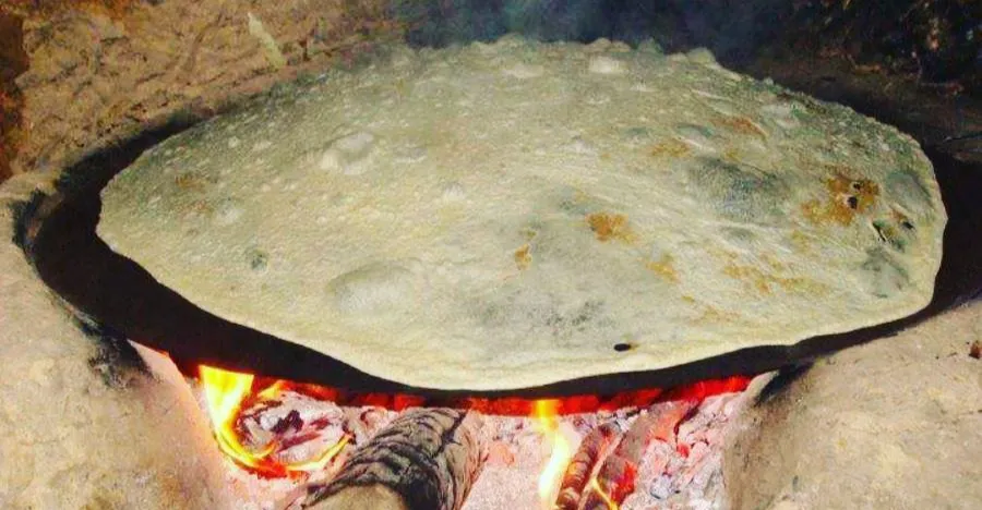 smoky-saj-bread,-a-symbol-of-generosity-in-feyli-kurdish-ilam’s-food-culture-–-shafaq-news