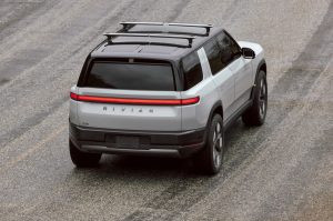 rivian-cuts-hundreds-of-workers-after-r2-deliveries-start-|-techcrunch