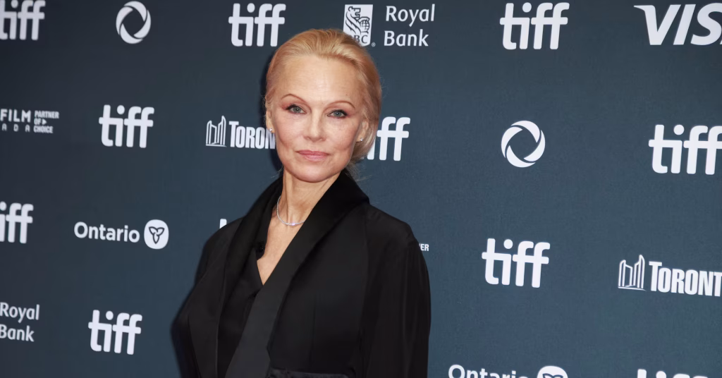 pamela-anderson-turns-heads-in-dramatic-red-gown-at-venice-film-festival